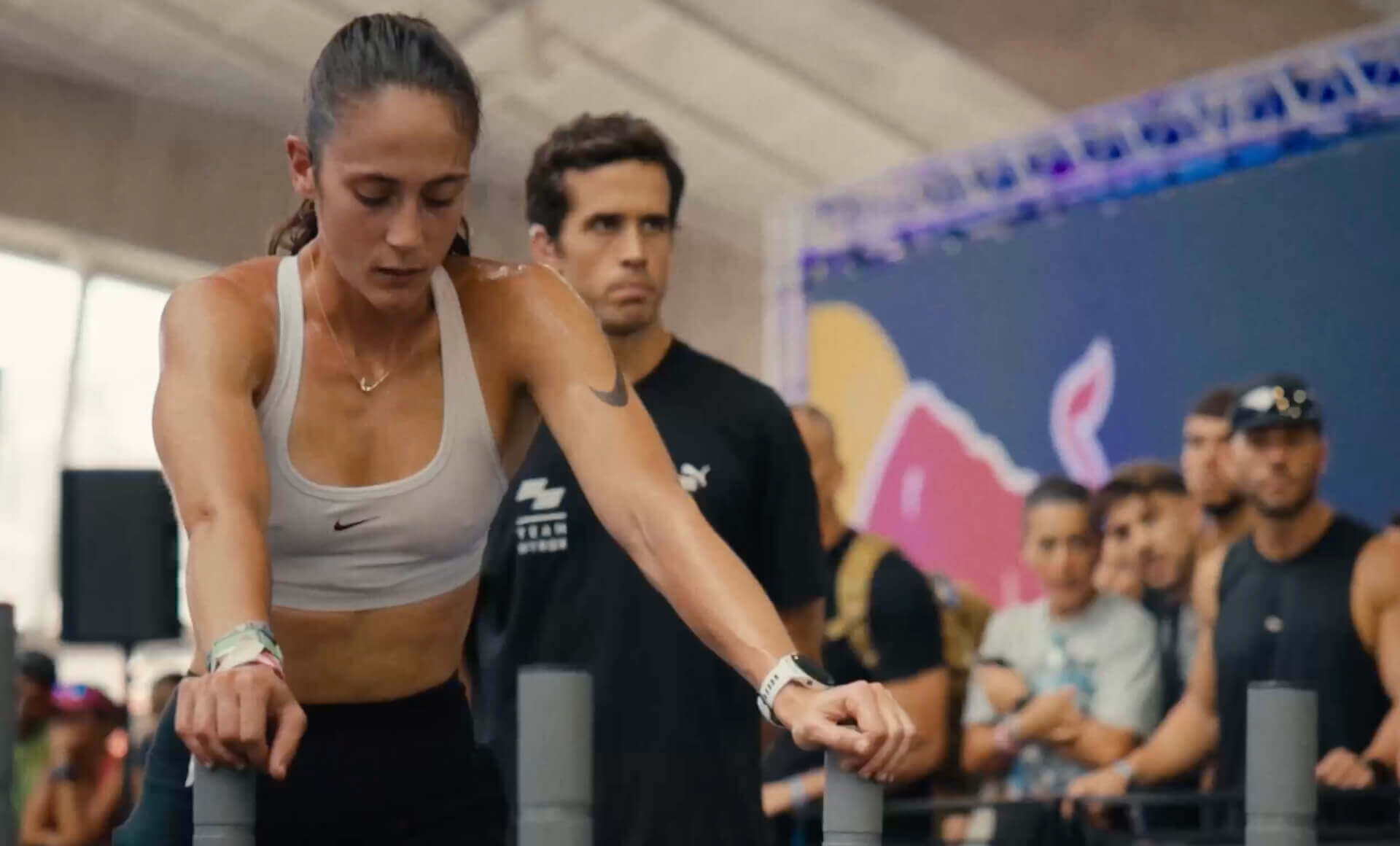 Manuela García competes in HYROX in front of a crowd, taking on a test of strength and endurance.